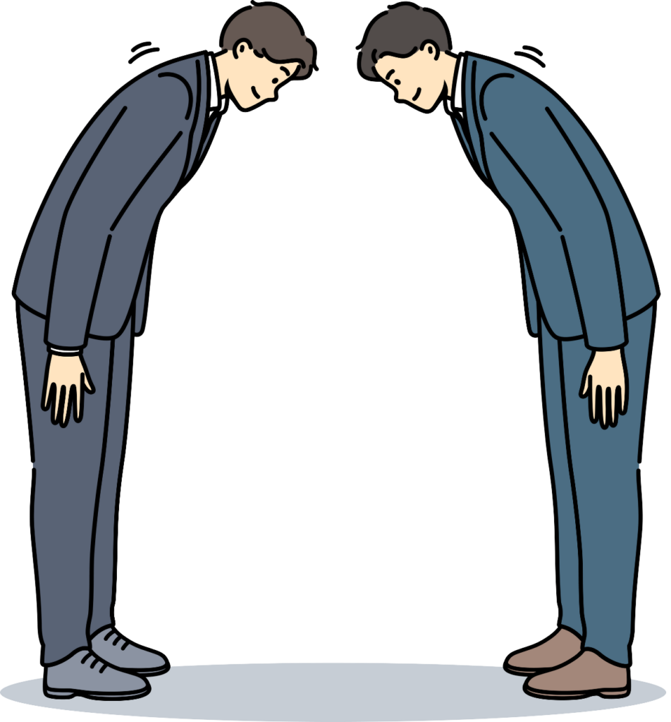 Two japanese business men wearing suit and bowing to each other